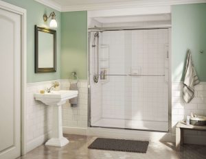 a newly remodeled bathroom with step-in shower and glass doors